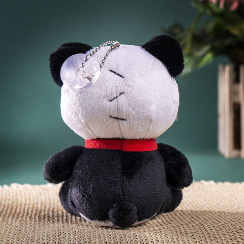 Image shows a back view of the stuffed panda. It has a suction cup hanging from a chain attached to the top of its head.