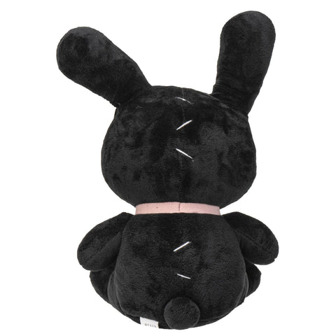 Image shows a back view of the stuffed bunny. Its back is stitched together.