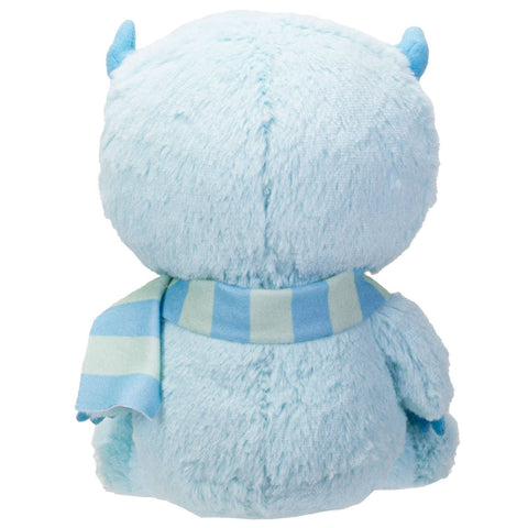 Image shows a back view of the stuffed yeti