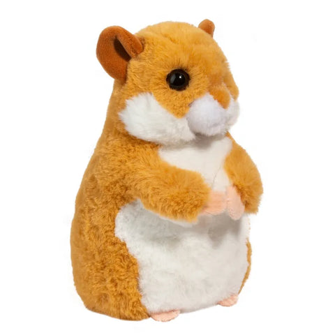 A side-angle view of the plush hamster