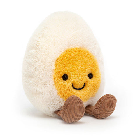 Image shows a stuffed hardboiled egg with a happy face and feet