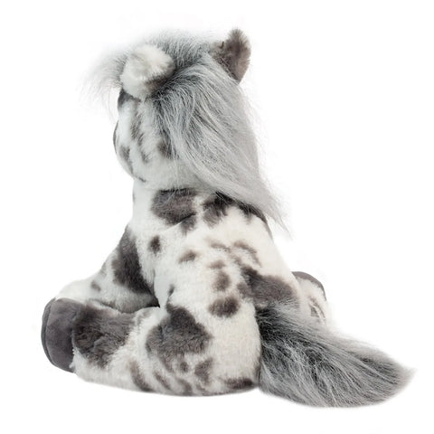 A back view of the plush spotted horse