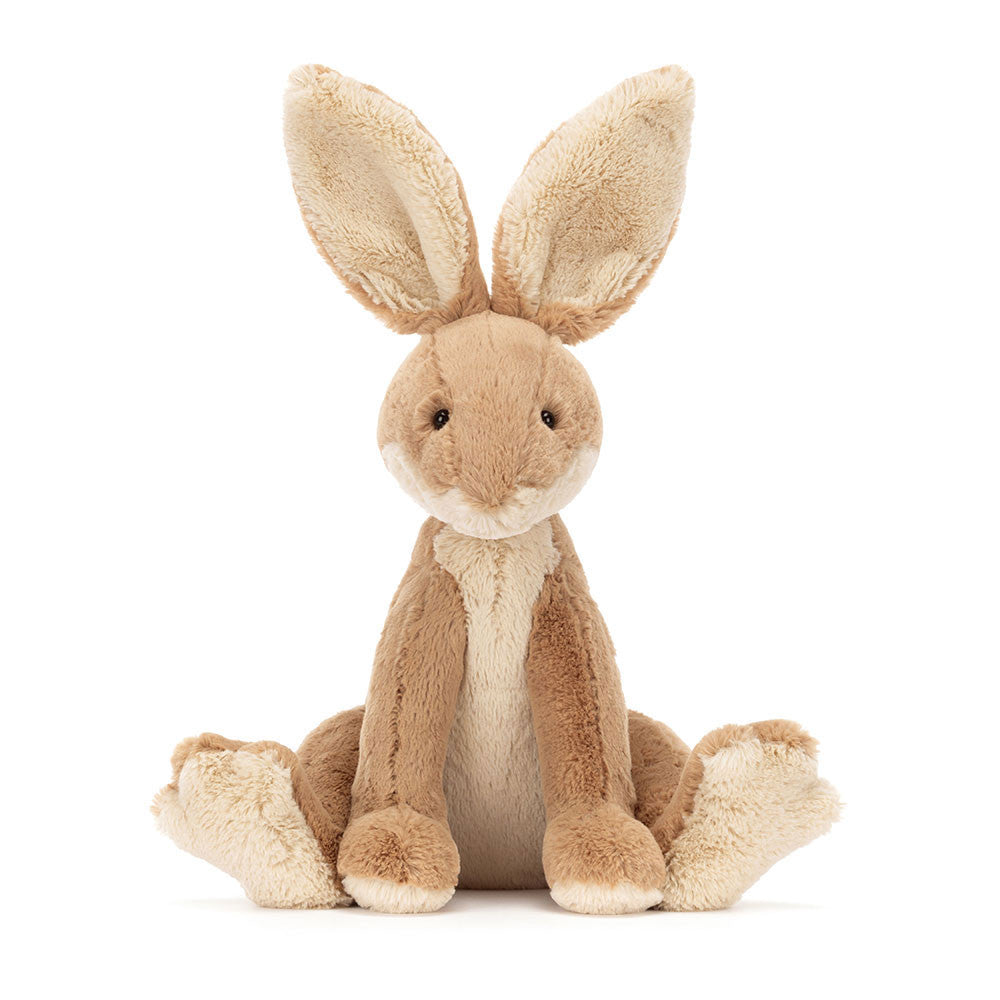 Image shows a stuffed hare with long legs and large ears