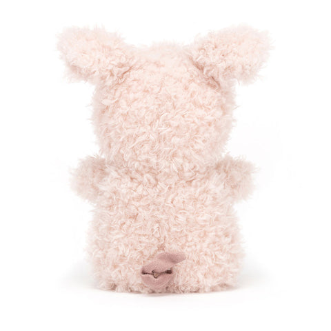 Image shows a back view of the stuffed pig. You can see its curly tail.