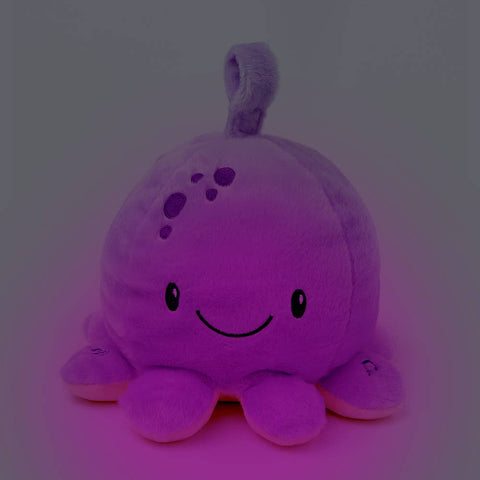 A purple octopus with a slight glow on a dark background