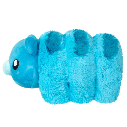 Side view of the plush blue tardigrade on a white background