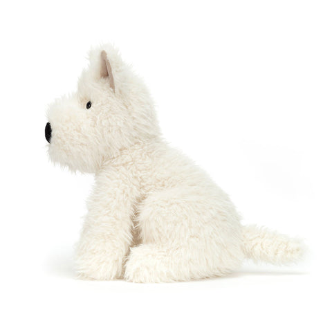 Image shows a side view of the stuffed white Scottish Terrier