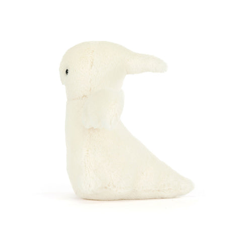 Side view of a white plush ghost toy on a white background