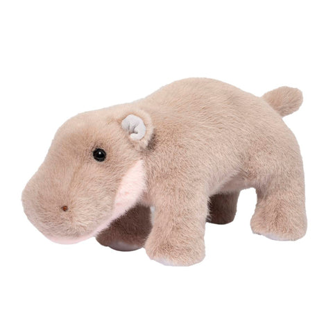 Plush toy pygmy hippo on a white background