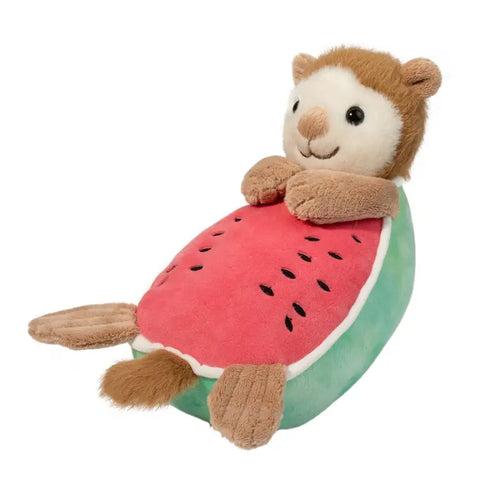 A side view of the plush otter-melon