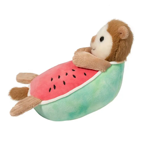 A side view of the plush otter-melon
