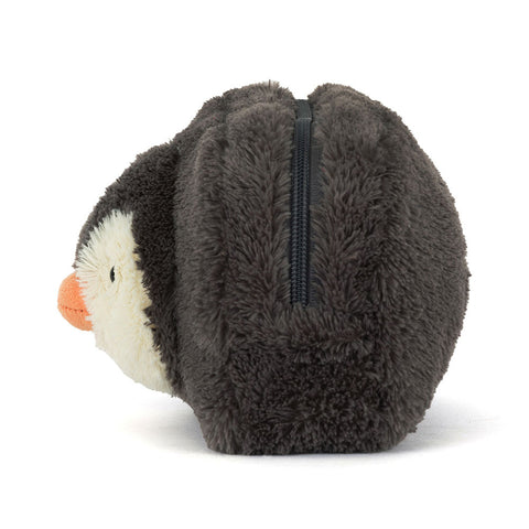 Image shows a side view of the plush zipper pouch. You can see the 3D face of the stuffed penguin.