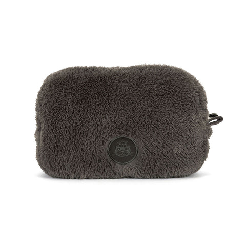 Image shows a back view of the plush penguin pouch. It has the Jellycat logo embroidered on the back.