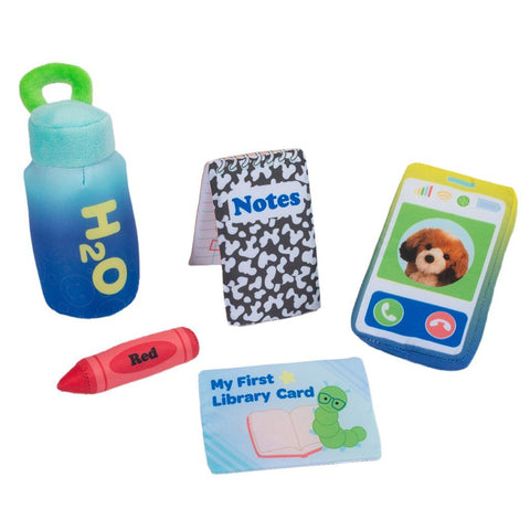 Image shows a plush water bottle, notebook, crayon, library card, and cell phone.