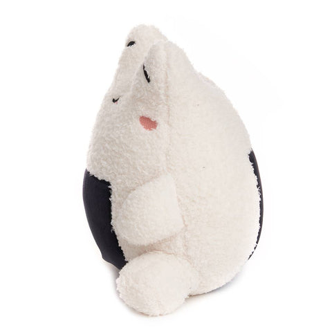 A side view of the plush rice ball frog
