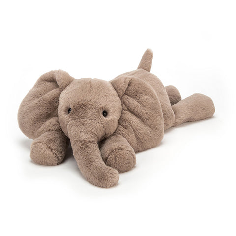 Image shows a floppy, grey stuffed elephant