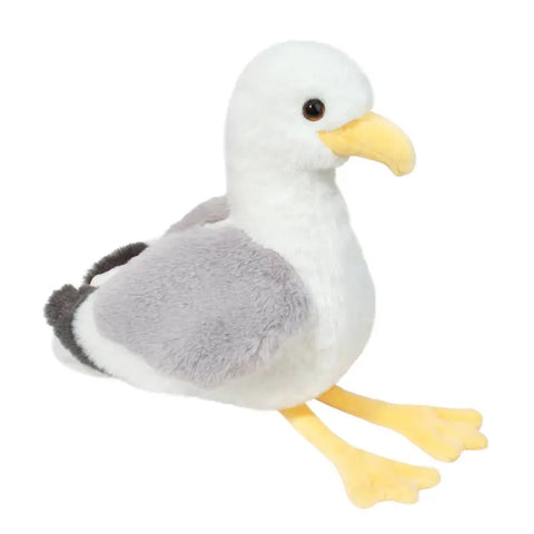 A plush seagull with red plastic eyes