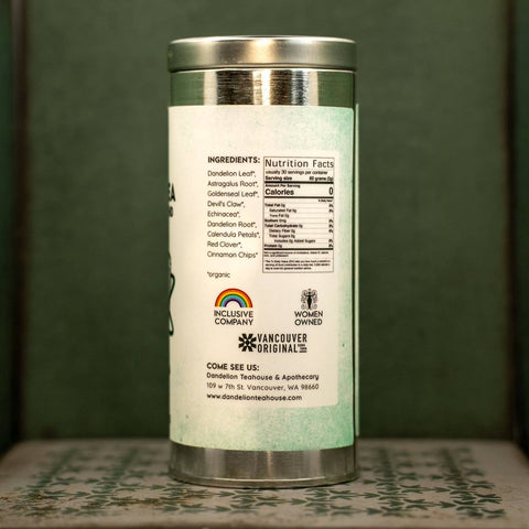 Herbal tea canister with white label. Label lists ingredients and nutrition facts.