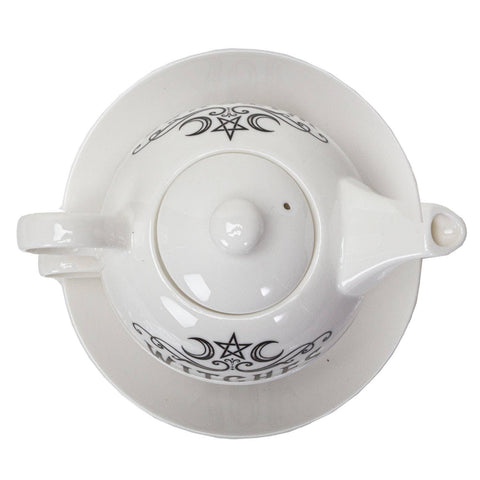 Image shows a top-down view of the tea set