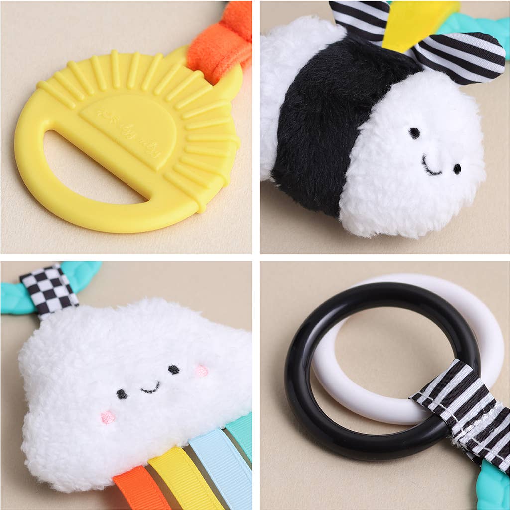 Images shows a closeup of each component of the teether - a yellow teether, black & white bee, cloud, and black & white rings.