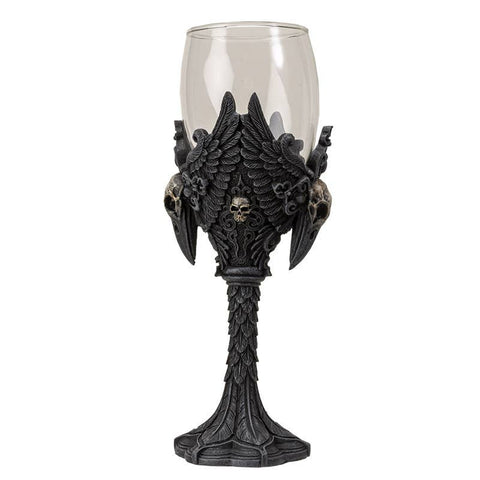 Image shows a side view of the wine goblet. There is a raven skull on either side and a small human skull in the middle.