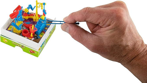 Image shows the miniature mouse trap game next to a hand. It is slightly smaller than the adult hand.
