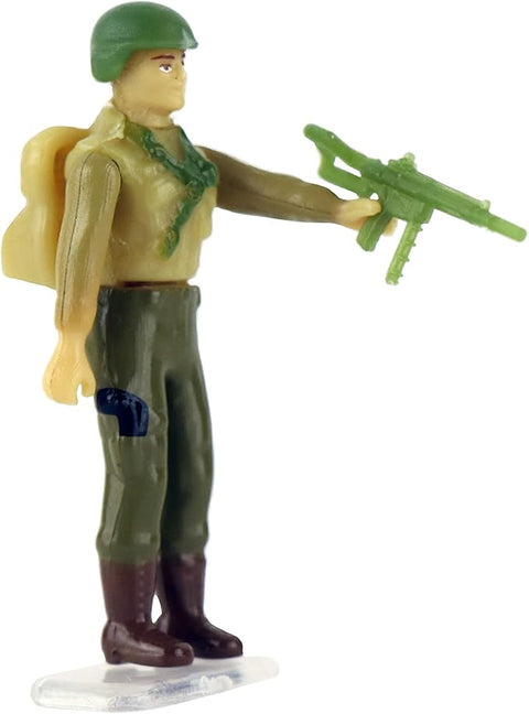 Image shows one of the world's smallest figurines. He wears army clothes and carries a gun.