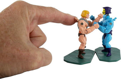 Image shows the MOTU Rock Em Sock Em Robots next to a human hand. They are about as tall as his finger.
