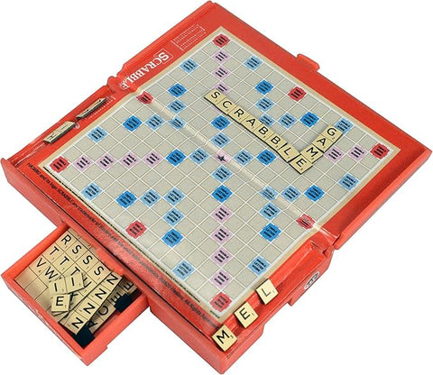 Image shows the world's smallest scrabble game. It has a pullout drawer to store the letter tiles.