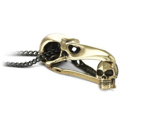 Jewelry - Raven Skull With Human Skull Necklace (Bronze)