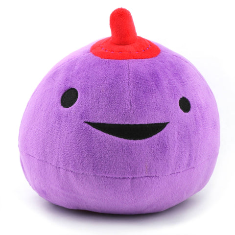 Image shows a stuffed purple breast with a red nipple and a smiley face