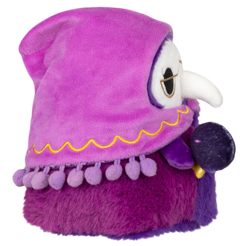 A side view of the plush fortune teller plague doctor