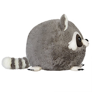 A side view of the plush baby raccoon. Its body is very round.