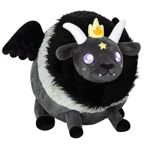 A plush goatlike creature (Baphomet). It is black and grey with large purple eyes.
