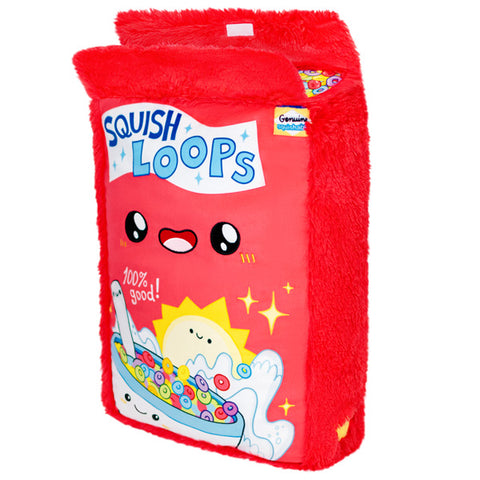 A plush cereal box toy with a red background and a face with eyes and a smile, labeled 'SQUISH LOOPS', on the front.