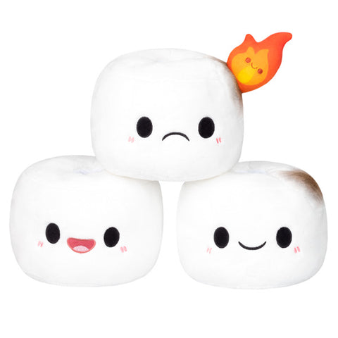 The plush marshmallows are loose from the stick and piled together