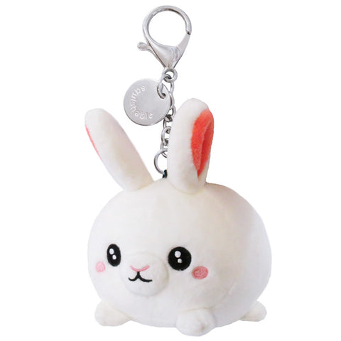 A fluffy white plush bunny attached to a silver keychain clip