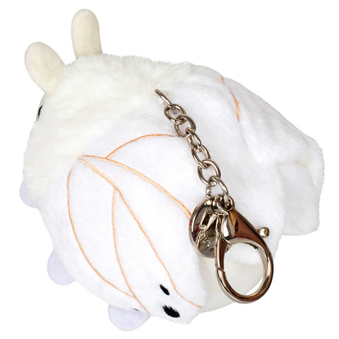 A back view of the stuffed poodle moth keychain
