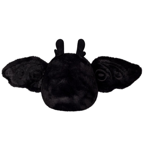 A back view of the plush baby Mothman with his wings open
