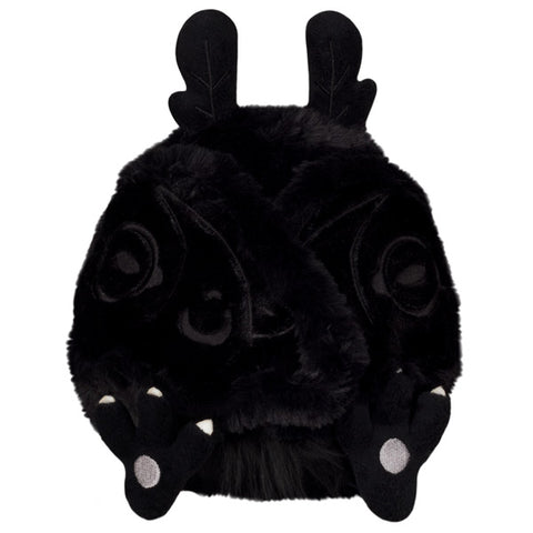 A front view of the plush baby Mothman with his wings closed. They are held together by magnets.