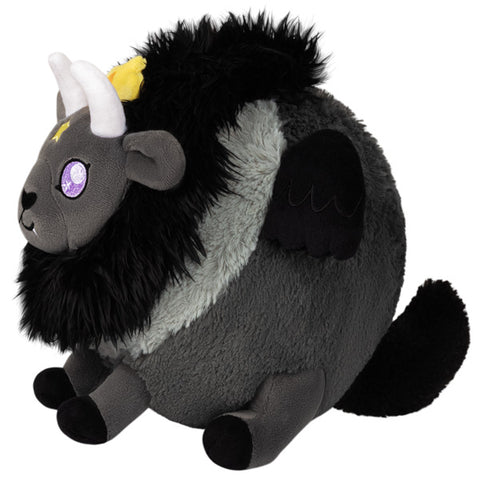 A side view of the plush Baphomet. Its body is very round.