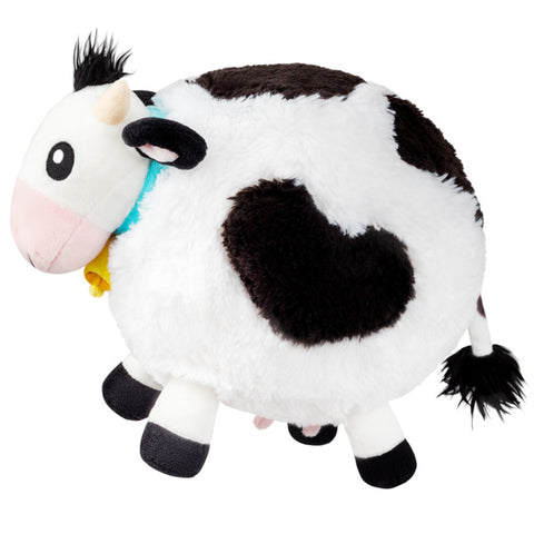 A side view of the plush cow