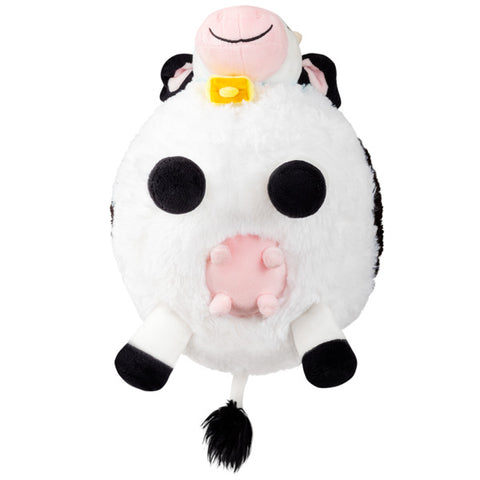 An underside view of the plush cow. It has a pink udder.