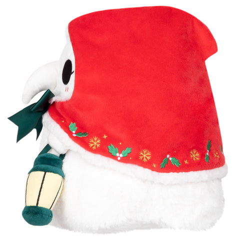A side view of the festive Plague Nurse. She has embroidered details on her hood.
