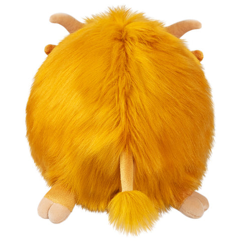 A back view of the plush highland cow