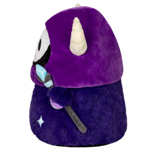 A side view of the plush mini Lich