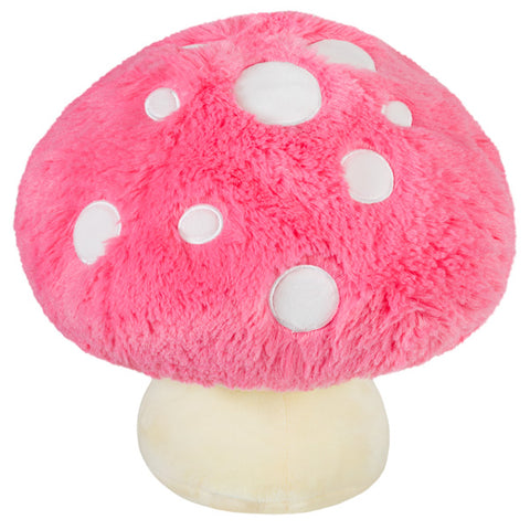 A back view of the pink plush mushroom