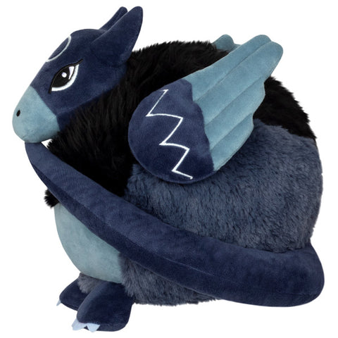 A side view of the plush Ouroboros