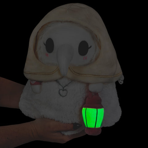 The plague nurse's lantern glowing in the dark.