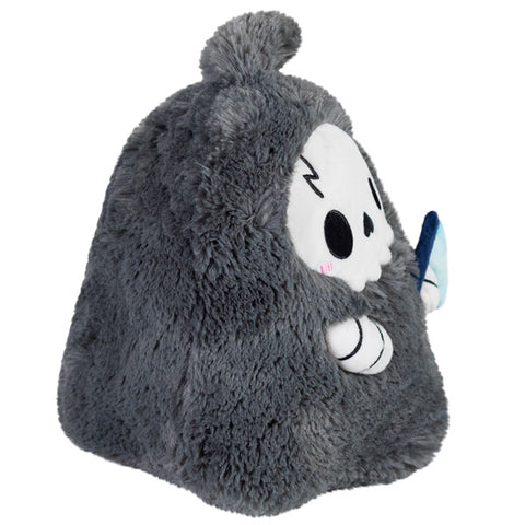 A side view of the plush reaper on a white background